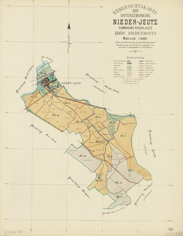 Ein alter Papierplan von Nieder-Jeutz, Deutschland, der Straßen, Gebäude und andere Merkmale mit Textanmerkungen zeigt.