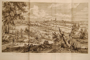 Offenes Buch mit dem Titel 'Ansicht der Schlacht von Castellum und Castellium, aus der Illustrated London News' mit einer Landschaftsillustration mit Menschen, Bäumen, Pflanzen, Gebäuden und Wolken.