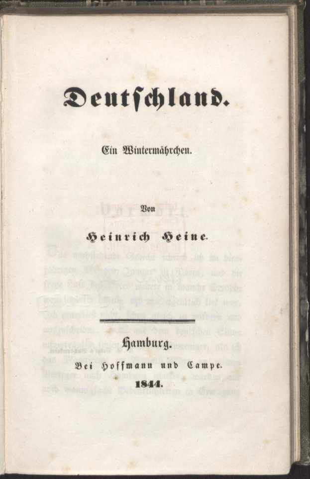 Altes Buch mit dem Titel "Deutschland" vor schwarzem Hintergrund.