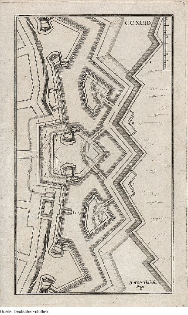 Ein von Hand gezeichneter Stadtplan auf Papier mit dichter Bebauung und begleitendem Text.