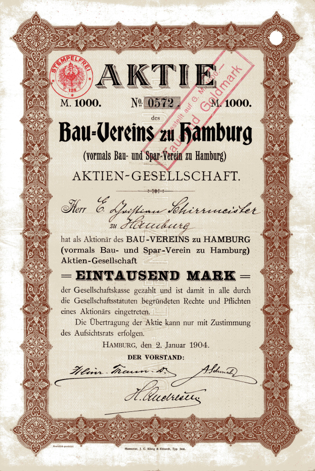 Ein altes Aktienzertifikat mit rotem Rand und weißem Hintergrund, das den Text 'Aktie Bau-Vereins zu Hamburg' anzeigt.